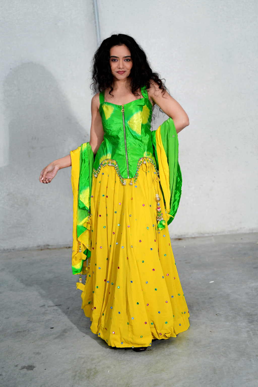 Sunshine Yellow Lehenga with Green Corset-Style Blouse