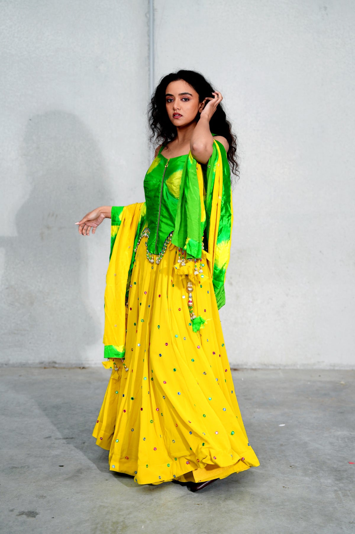 Sunshine Yellow Lehenga with Green Corset-Style Blouse