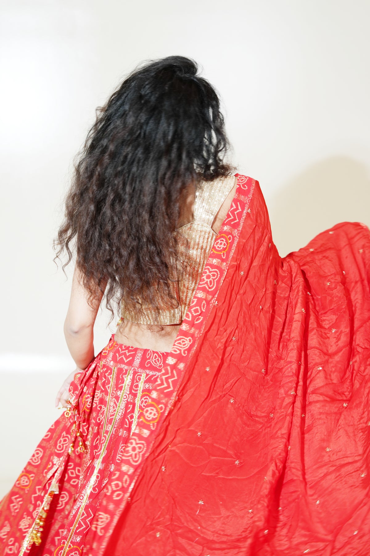 Red Printed Lehenga with Gold-Toned Blouse