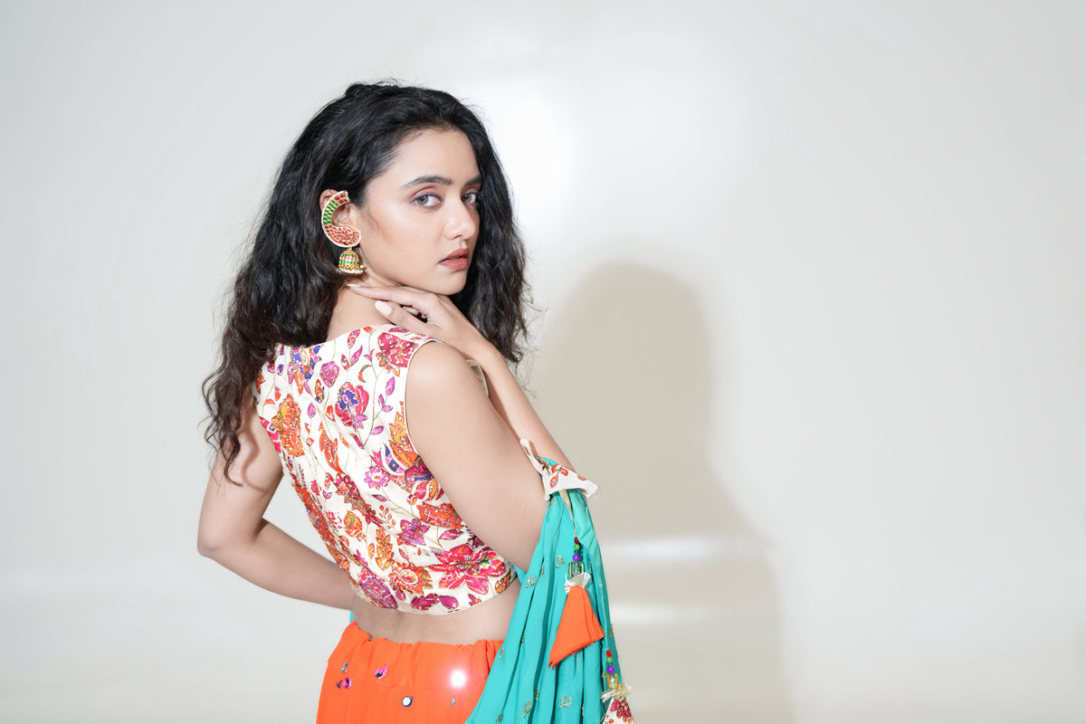 Orange Lehenga with Floral Blouse & Turquoise Dupatta