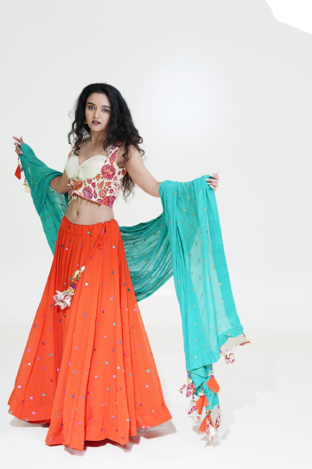 Orange Lehenga with Floral Blouse & Turquoise Dupatta