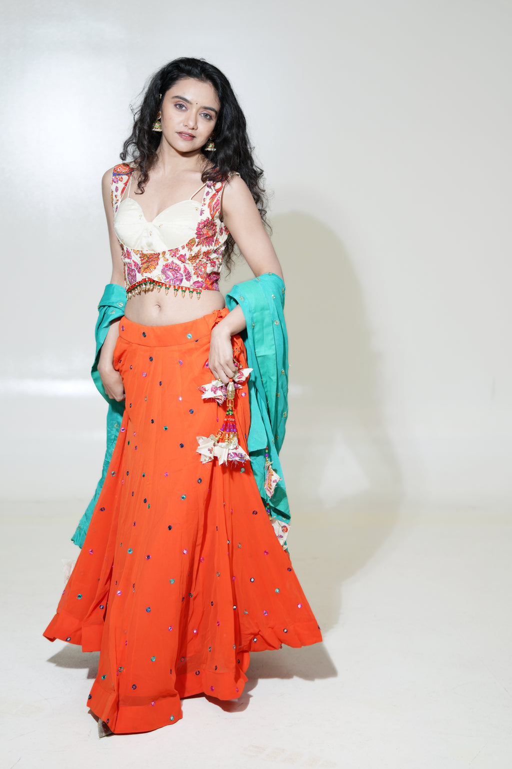 Orange Lehenga with Floral Blouse & Turquoise Dupatta