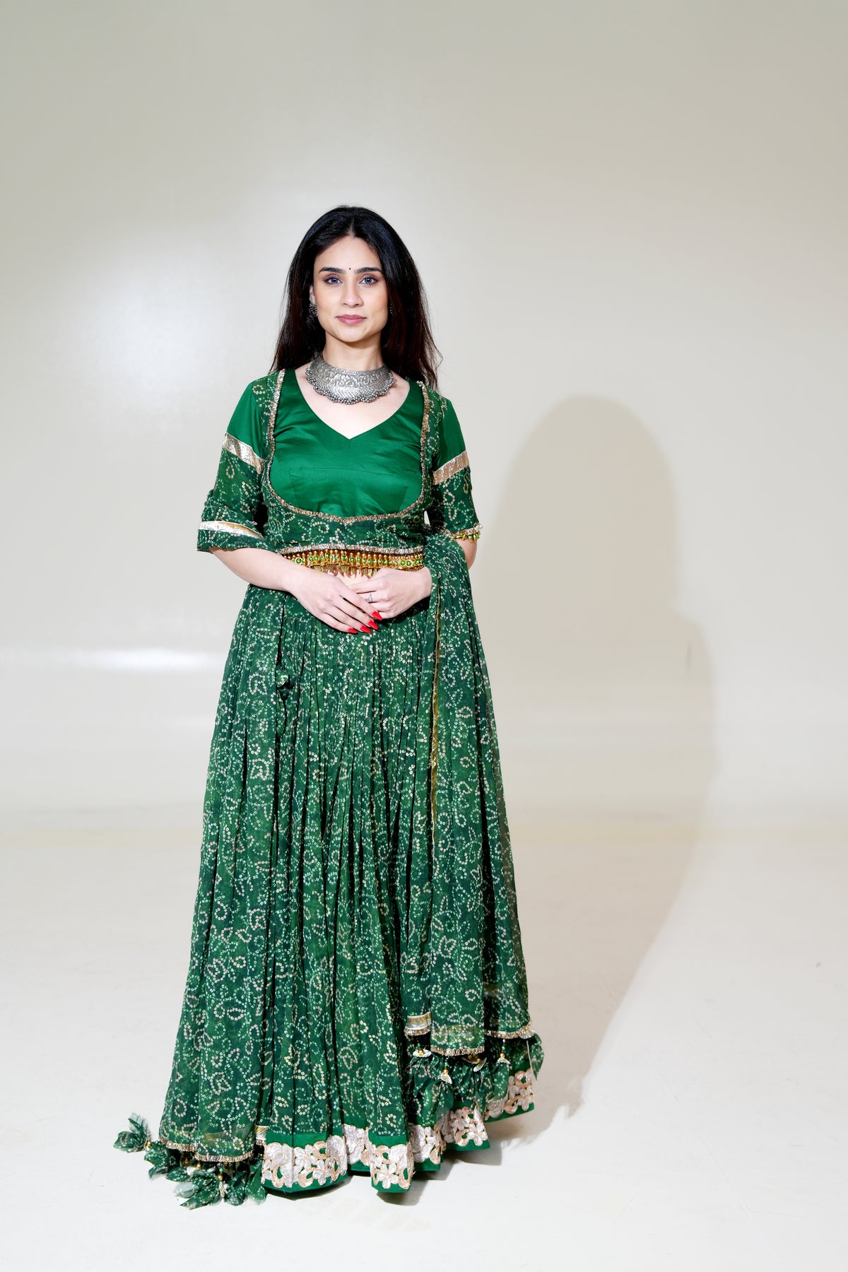 Emerald Green Patterned Lehenga with Gold-Toned Trim