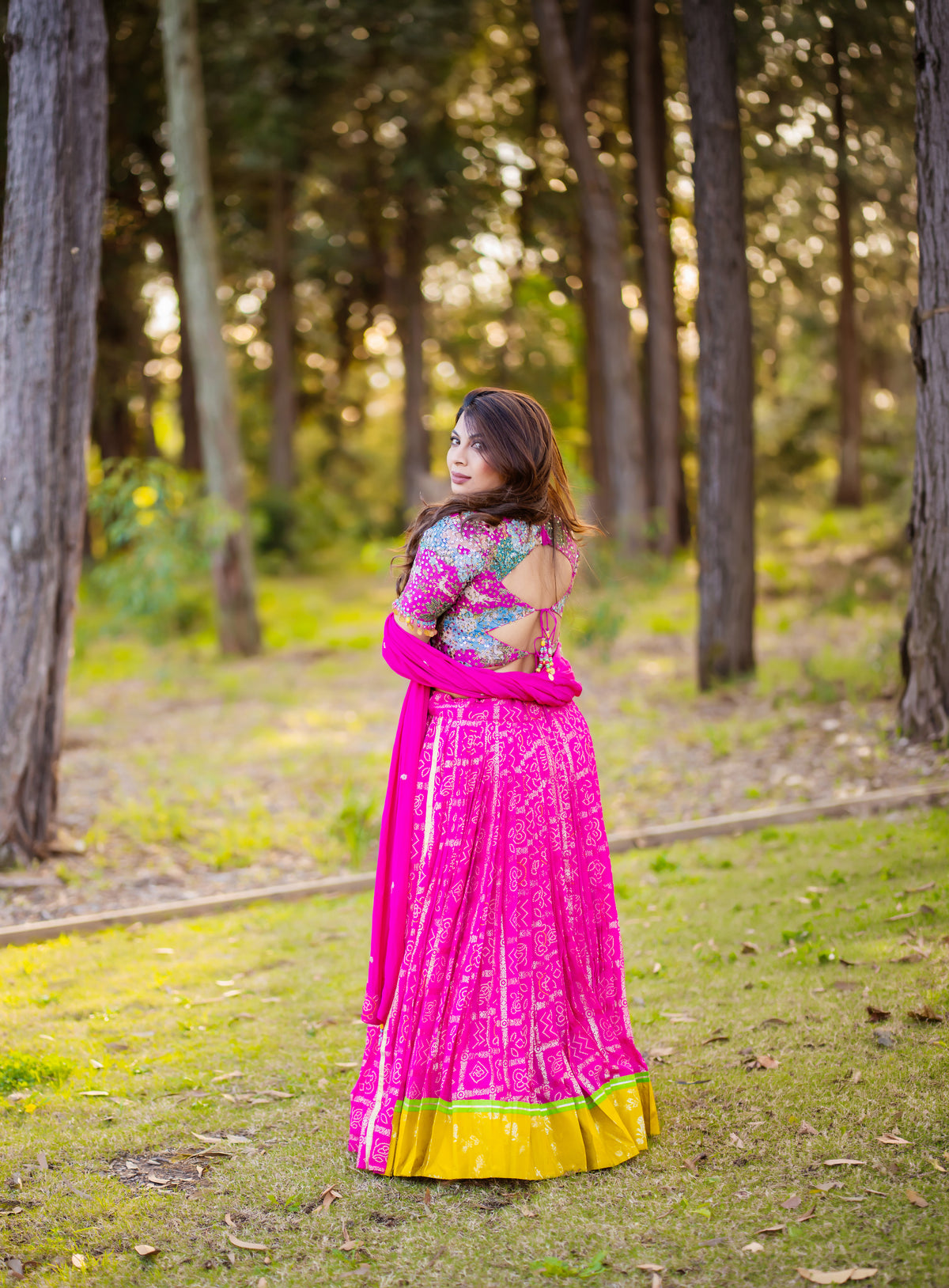 Fuchsia Printed Lehenga with Multicoloured Blouse & Yellow Border