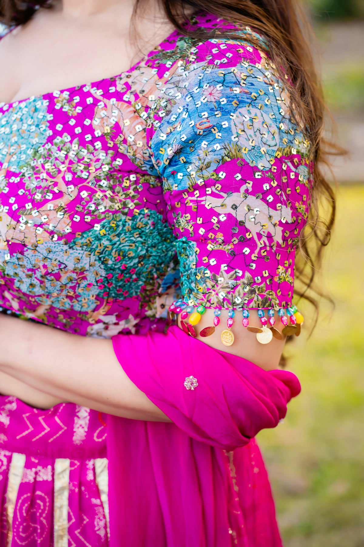 Fuchsia Printed Lehenga with Multicoloured Blouse & Yellow Border