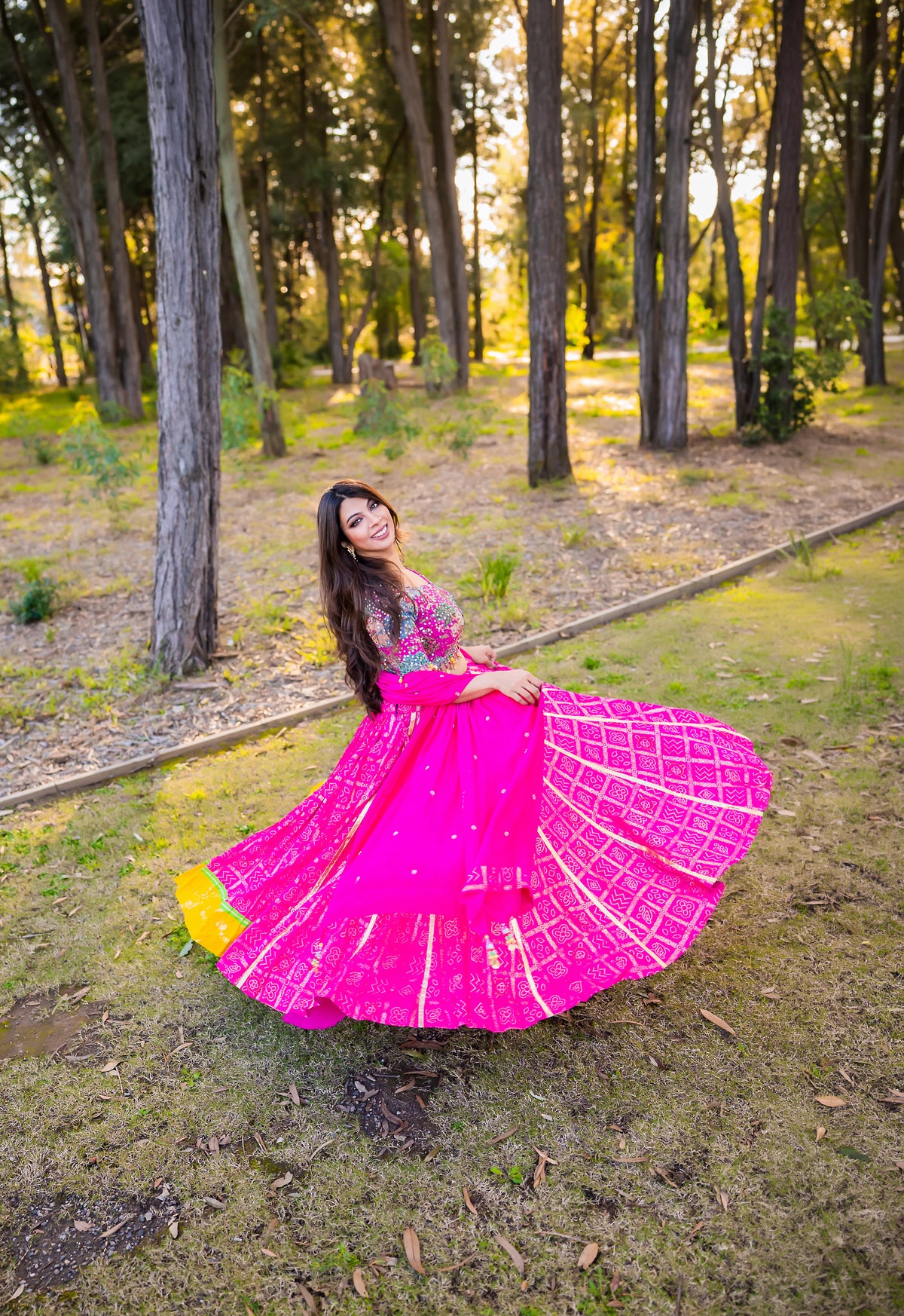 Fuchsia Printed Lehenga with Multicoloured Blouse & Yellow Border