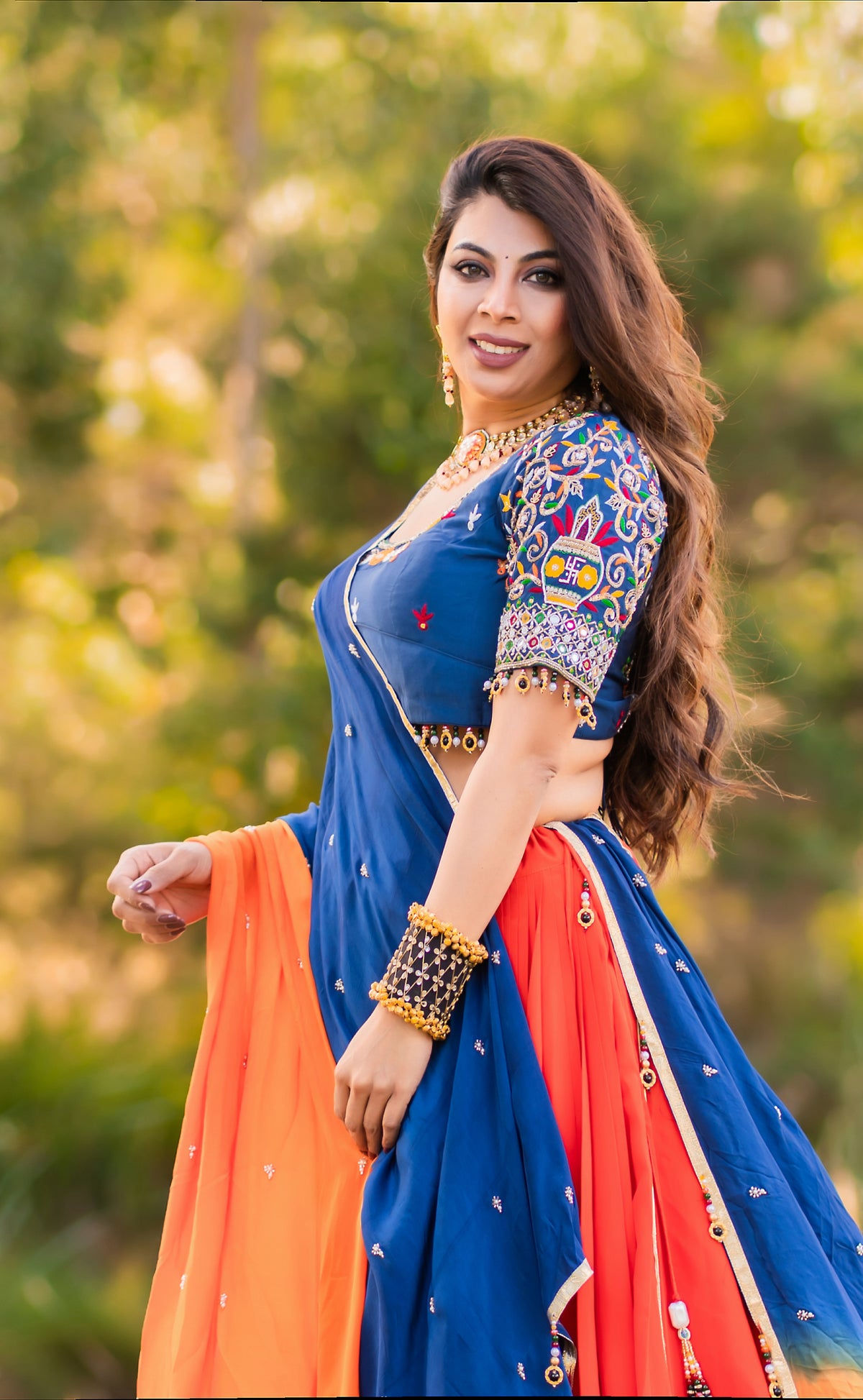 Coral Lehenga with Blue Blouse & Two-Tone Dupatta