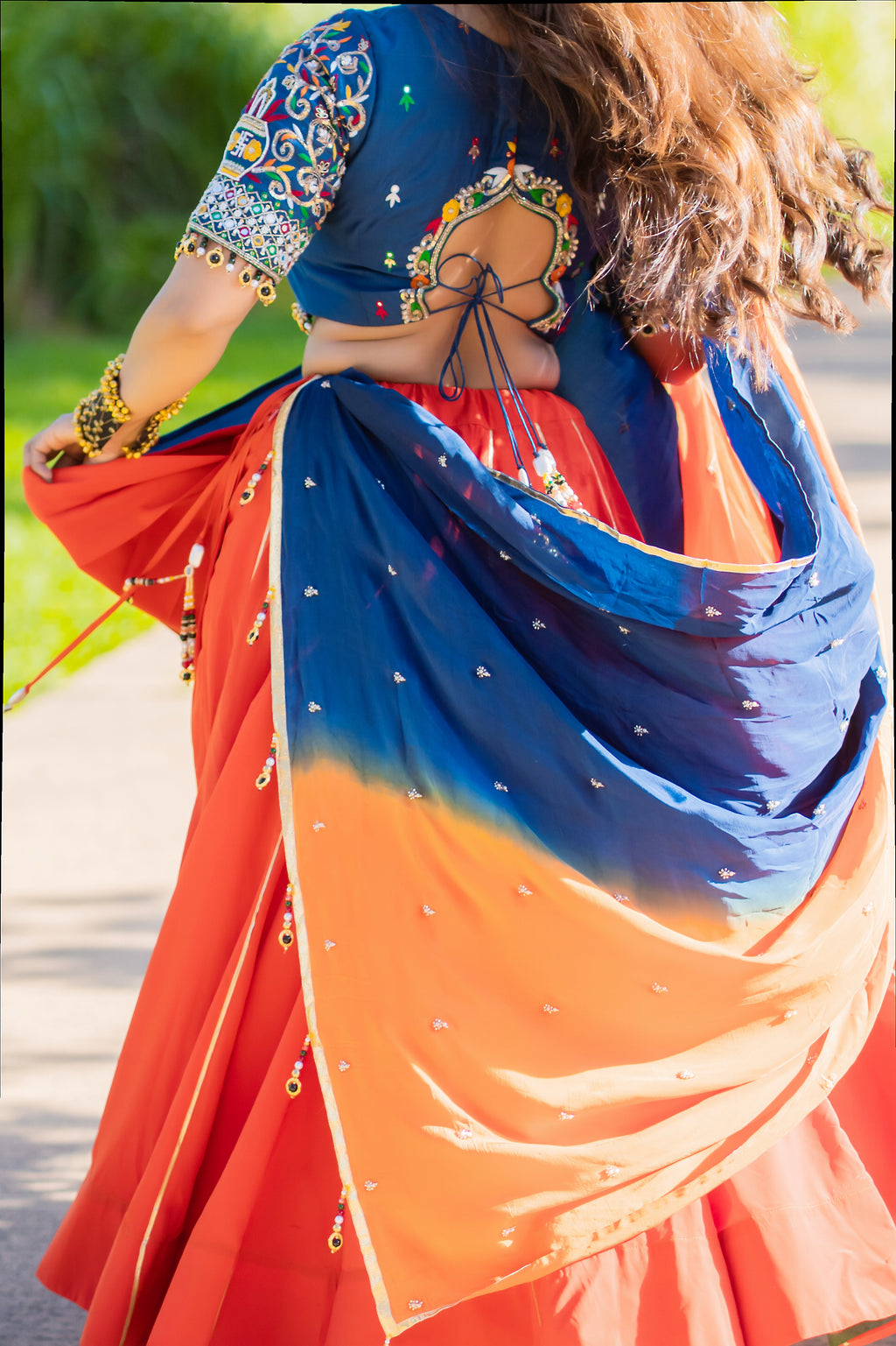Coral Lehenga with Blue Blouse & Two-Tone Dupatta